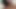 Azgın orta yaşlı seksi kadın bağlandıktan ve kırbaçlandıktan sonra klitorisle sikiliyor