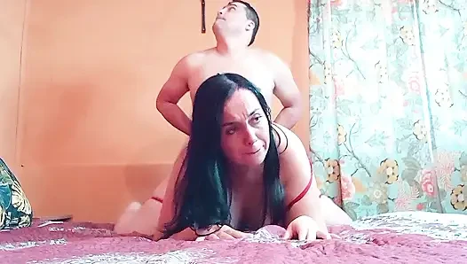 Curvy Latina in a red dress gets a good fucking in doggy style.