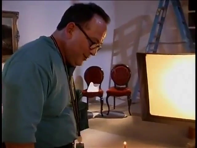Behind the scenes footage of a camera crew filming a porn movie