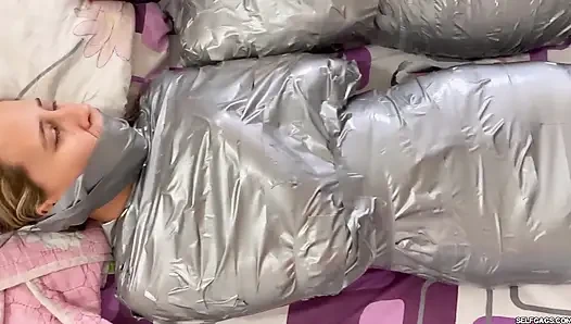 5 Mummified Girls Struggle All Wrapped up and Gagged!