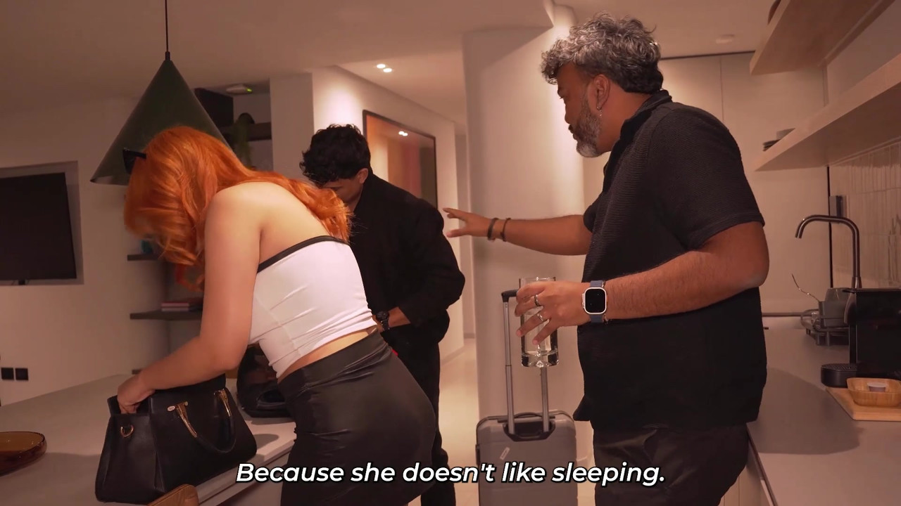 I share the same hotel bed with my stepmother due to a hotel error.