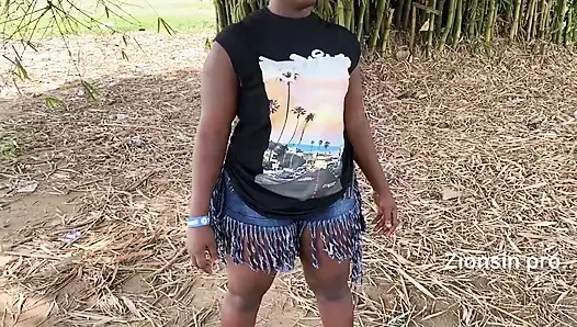 Ebony sexy black girl dances in outdoor with much laughter