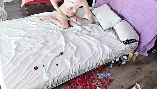 Sensual massage of a hot couple with oil on the body. Foreplay in the bedroom with an amateur couple.