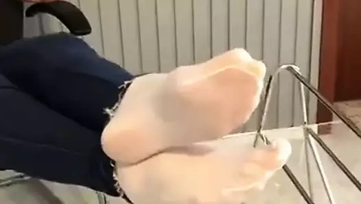 Jeans and nylon feet