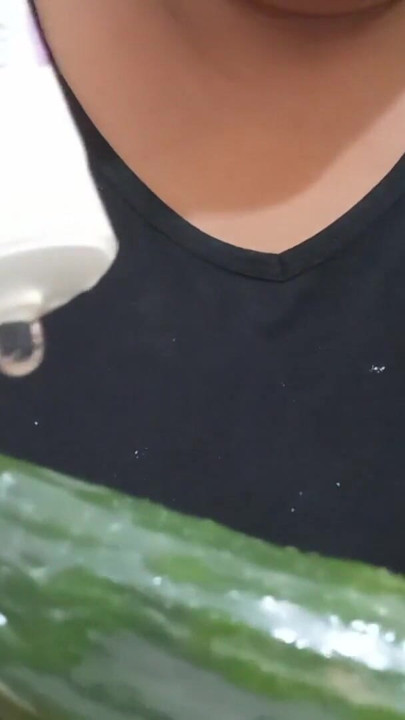 Fat mom inserts a cucumber into her chubby pussy | Clip 1