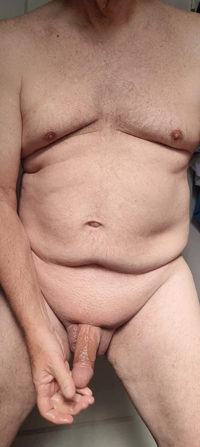 Morning masturbation - shaved, oiled, and ready to start my day with a slow stroke of my cock