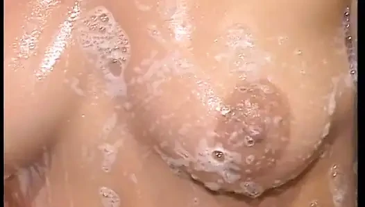 Hairy MILF slut masturbates under shower