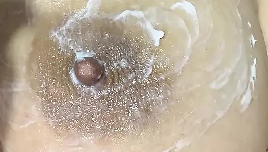 Mom vibrates her big tits with her big vibrator