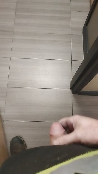 Jerking and cumming in public bathroom hallway