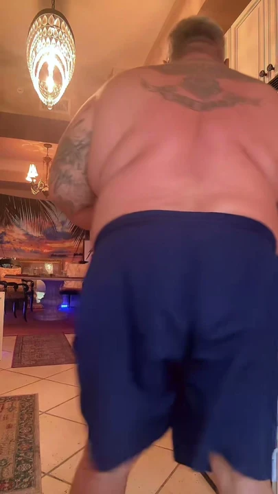 The handsome sexy big bear cooks dinner for you