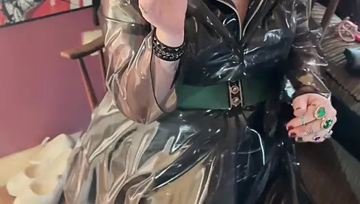 PVC Clad In Her See Through Coat Miss Tina Snua Smokes A Cigarette For You