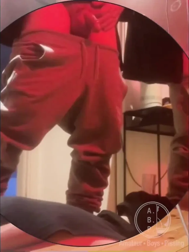 Amateur Boy Pissing in a Glass Held in His Friend's Mouth