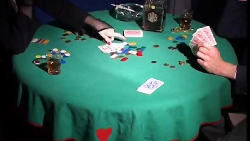 Guy wins a slut after a round of poker and fucks her on the table