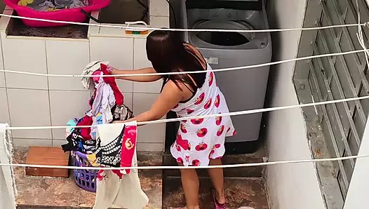The neighbor is watched washing clothes by her neighbor
