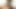 Ladyboy aynanın önünde çıplak poz veriyor ve kıllı kıçını yayıyor