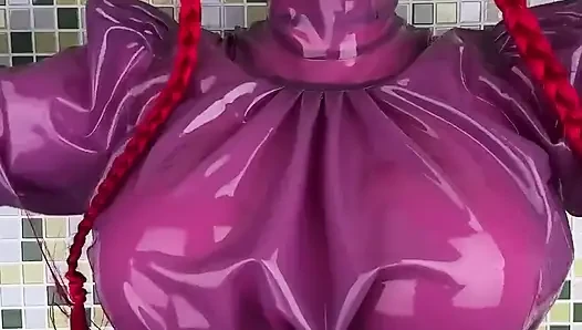 Bayan fetilicious pembe ve mor lateks giyiyor