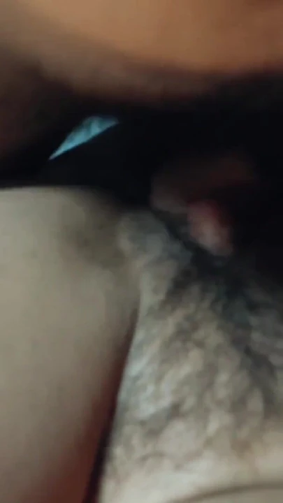 Missionary position with cock starting to get an erection, he rubs his penis on the hairy pussy. | Clip 1