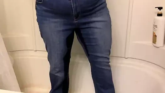Wet jeans in the shower for Ade