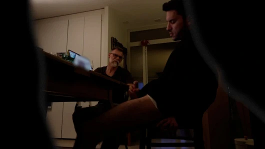 Boy jerking off at the dinner table