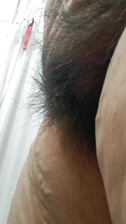 Mom's mature pussy is fat and hairy, perfect for fucking.