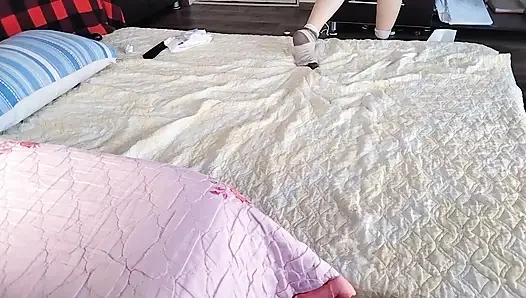 Sexy brunette doing naked chores around the house.