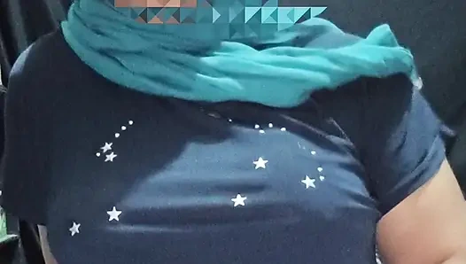 Blue hijab Muslim woman with seductive black t-shirt