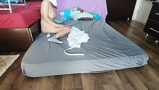 Sensual massage of a hot couple with oil on the body. Foreplay in the bedroom with an amateur couple.