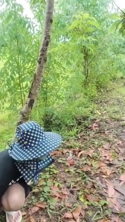 Thai Girl Walking Showing Along the Side of the Field Road in the Countryside Thai Outdoor Public | Clip 1