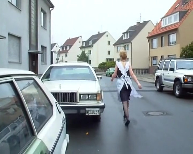 Two stunning German chicks sharing a loaded cock on the kitchen table