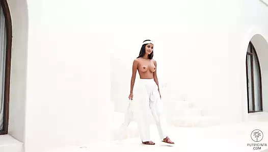 Daring young Asian Putri Cinta showing off her asshole