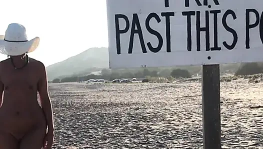 She pisses on the nudist beach