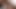 Sörfçü, photosession için bir yük alıyor