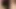 Vollbusige Blondine masturbiert mit grünem Toy