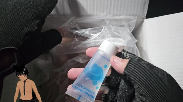 Playing with the pussy of a sex toy!