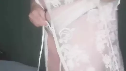 Granny ties herself up, while a little surprise gets into her pussy