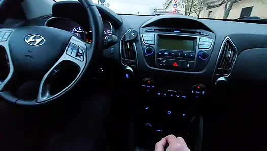 Amateur MILF gives a handjob to a taxi driver and teases him in the car, in public