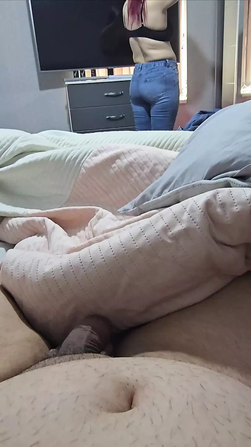 Step mom in blue jeans try new outfit in front of naked step son