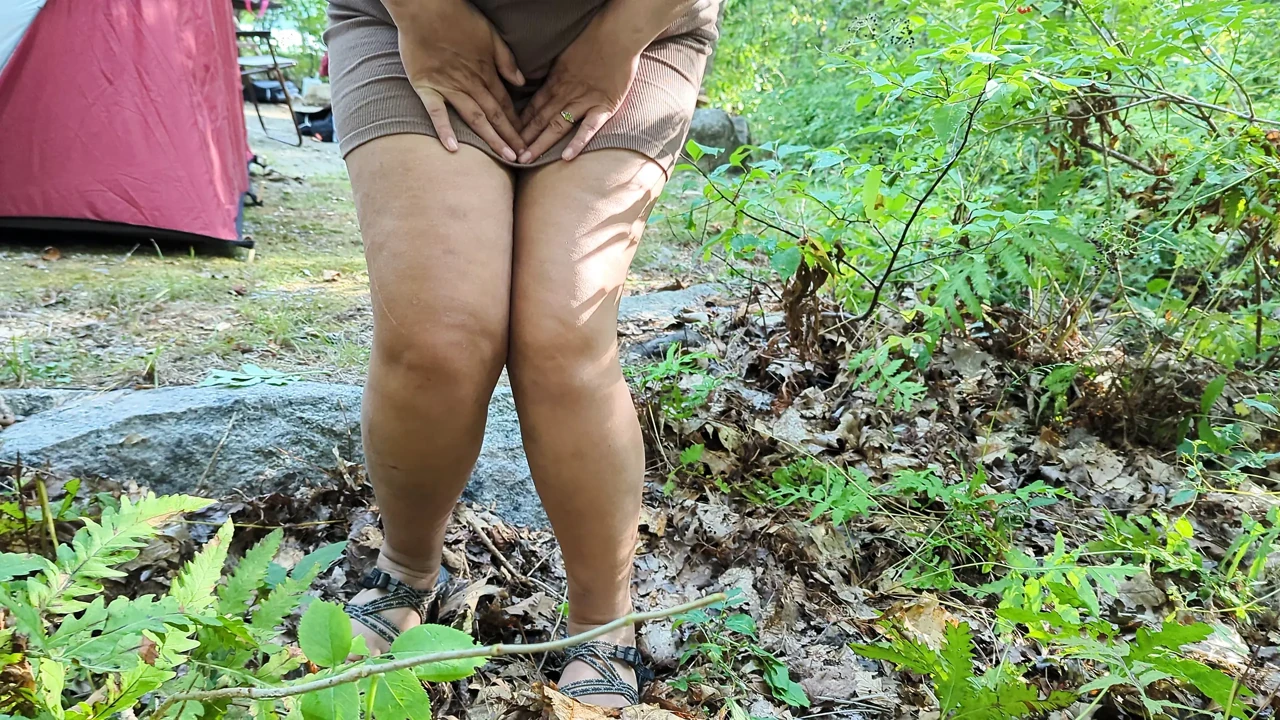 Naughty pissing at the campsite