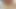 Büyük bir yapay penis üzerinde oturuyor