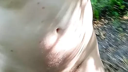 Naked boy walk in the wood