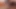 Seksi kız büyük takma yaraklı bir dildo emiyor ve sonra sert biniyor