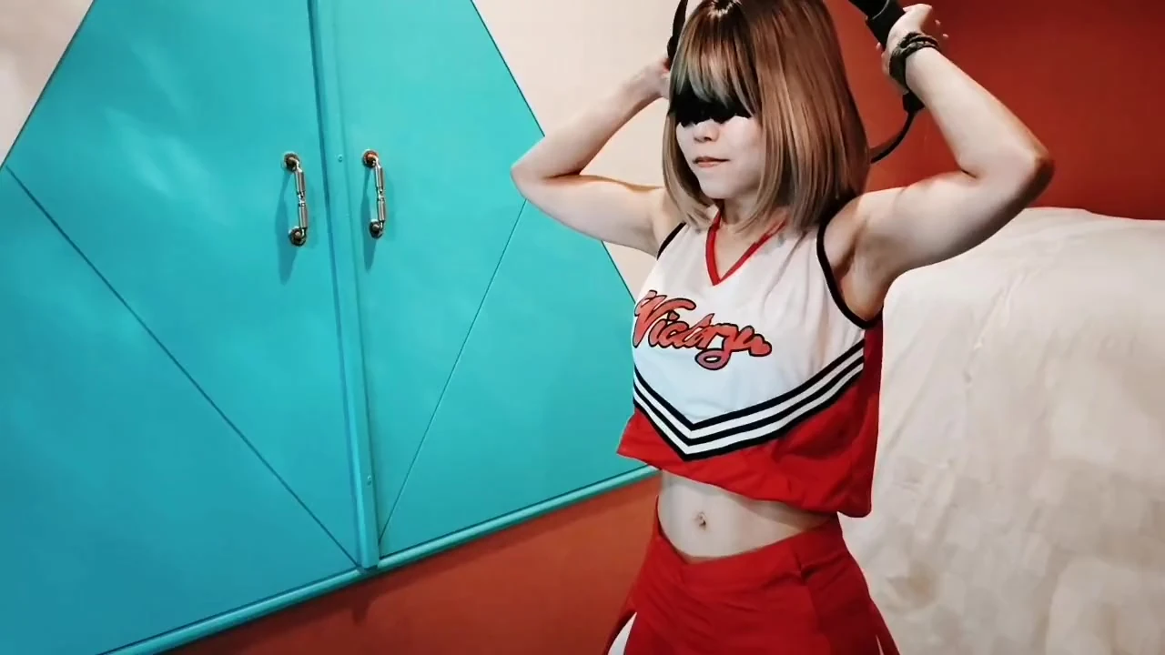 A cute busty married woman exercises 2 in a sexy cheerleader costume. Home made amateur Private Shoot