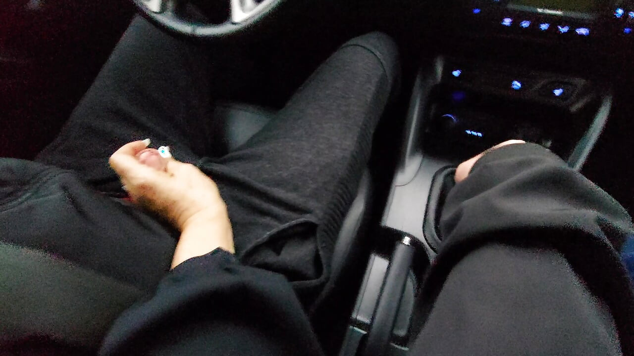 Amateur MILF gives a handjob to a taxi driver and teases him in the car, in public