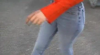 Sexy blonde Girl in skintight jeans and on high heels