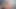 Zoe televizyonda porno izlerken azıyor ve sonunda kanepede kendine dokunuyor