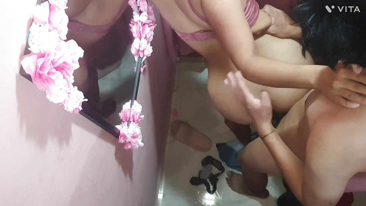 Couple having sex in a clothing store in the dressing room