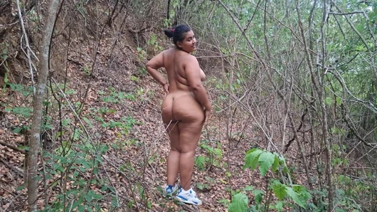 BBW Latina walks outdoors naked and uses her dildo