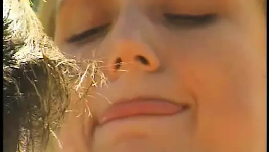 Blonde sucks a stiff cock poolside in her jeans