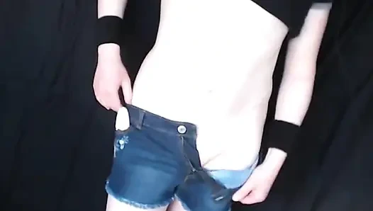 Smooth redhead femboy in a cage with a vibrator