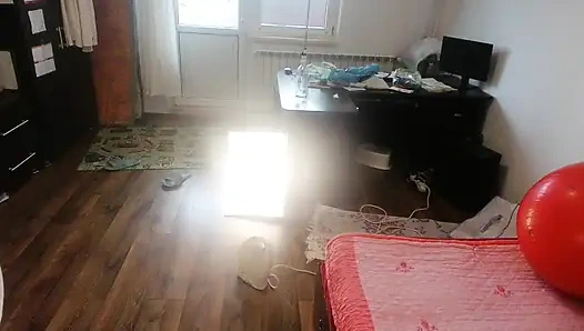 Amateur wife dancing naked at home. Amateur woman has fun trying on clothes and cutting them.